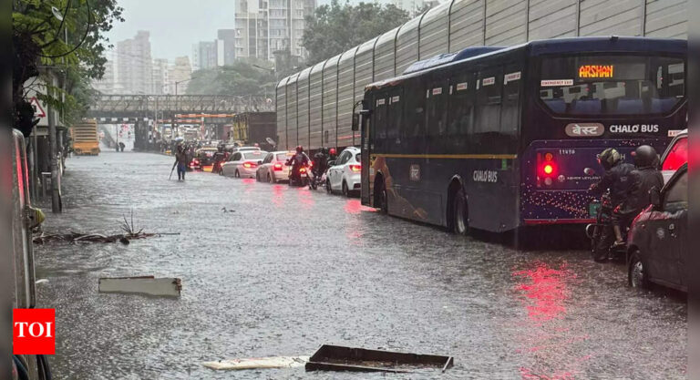Mumbai Rain: Trains crawl, roads waterlogged, buses diverted as Mumbai reels under heavy rain; ‘yellow’ alert upgraded to ‘orange’ | Mumbai News – Times of India