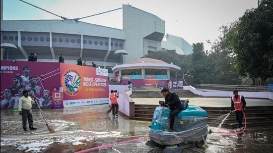 Workers-clean-the-premises-of-the-stadium-during-t_1784396089486.jpg
